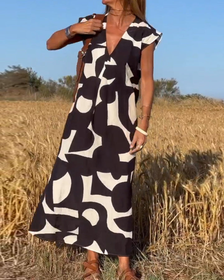 Victoria™ Elegant V-Neck Printed Dress